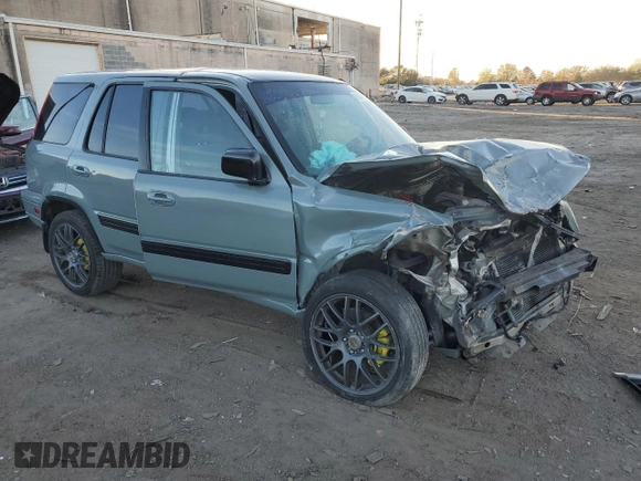 2000 Honda CR-V EX with VIN JHLRD1863YC006639, listed as a Copart auction lot 80442254 with 200,218 mi miles and Salvage Title. Bid and sale history available at carsss.com. Image 4.