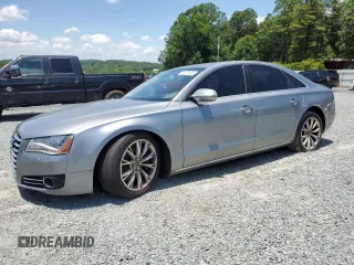 2011 Audi A8 with VIN WAUAVAFD0BN015607, listed as a Copart auction lot 61670435 with 205,402 mi miles and Clean title. Bid and sale history available at DreamBid. Image 1.
