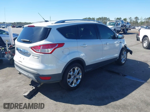 2015 Ford Escape Titanium with VIN 1FMCU0J94FUA69088, listed as a IAAI auction lot 41810406 with 167,749 mi miles. Bid and sale history available at carsss.com. Image 4.