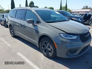 2021 Chrysler Pacifica Hybrid Limited z VIN 2C4RC1S76MR544495, wystawiony jako IAAI lot #42294312 z przebiegiem 89 083 mil mil oraz . Historia ofert i sprzedaży dostępna na DreamBid. Obrazek 1.