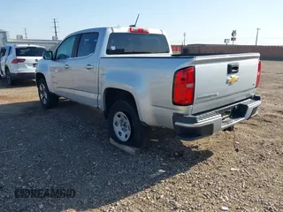 2018 Chevrolet Colorado 2WD LT z VIN 1GCGSCEN5J1300840, wystawiony jako IAAI lot #41997279 z przebiegiem 75 705 mil mil oraz . Historia ofert i sprzedaży dostępna na DreamBid. Obrazek 3.