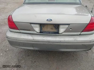 2005 Ford Crown Victoria LX with VIN 2FAFP74W05X174758, listed as a IAAI auction lot 41553606 with 192,103 mi miles. Bid and sale history available at carsss.com. Image 13.