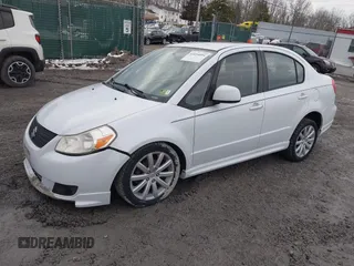 2010 Suzuki SX4 with VIN JS2YC5A43A6300225, listed as a IAAI auction lot 41654094 with 60,098 mi miles and . Bid and sale history available at DreamBid. Image 2.