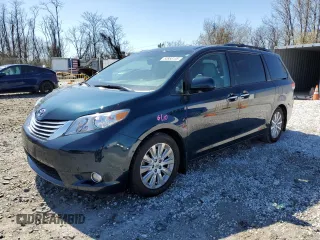 2011 Toyota Sienna XLE AAS with VIN 5TDYK3DC6BS170205, listed as a Copart auction lot 50868135 with 153,134 mi miles and Salvage Title. Bid and sale history available at DreamBid. Image 1.