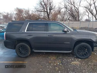 2015 GMC Yukon SLT with VIN 1GKS2BKC7FR110106, listed as a IAAI auction lot 41702260 with 108,679 mi miles. Bid and sale history available at carsss.com. Image 13.