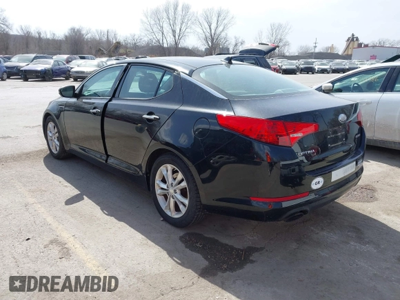 2013 Kia Optima EX z VIN 5XXGN4A7XDG198853, wystawiony jako IAAI lot #41807485 z przebiegiem 87 466 mil mil oraz . Historia ofert i sprzedaży dostępna na DreamBid. Obrazek 3.