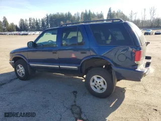 2000 Chevrolet Blazer LT with VIN 1GNDT13W8Y2119632, listed as a Copart auction lot 47387175 with 140,356 mi miles and Salvage Title. Bid and sale history available at carsss.com. Image 2.