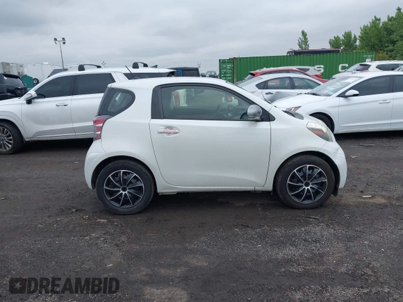 2012 Scion iQ with VIN JTNJJXB08CJ019333, listed as a IAAI auction lot 42348785 with 138,501 mi miles and . Bid and sale history available at DreamBid. Image 13.