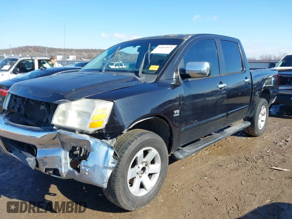 2004 Nissan Titan LE with VIN 1N6AA07A44N591357, listed as a IAAI auction lot 41464024 with 296,954 mi miles and . Bid and sale history available at DreamBid. Image 2.