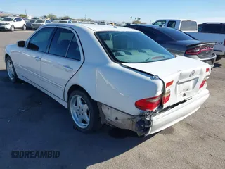2002 Mercedes-Benz E-Class with VIN WDBJF82J62X076581, listed as a IAAI auction lot 41194976 with 235,453 mi miles. Bid and sale history available at carsss.com. Image 6.