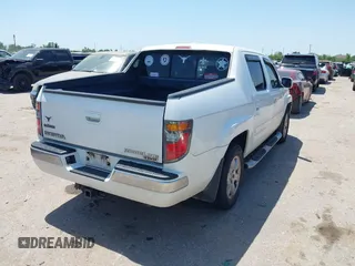 2008 Honda Ridgeline RTL z VIN 2HJYK16568H529221, wystawiony jako IAAI lot #42027640 z przebiegiem 143 536 mil mil oraz . Historia ofert i sprzedaży dostępna na DreamBid. Obrazek 4.