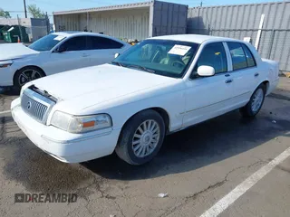 2008 Mercury Grand Marquis LS z VIN 2MEFM75V68X647087, wystawiony jako IAAI lot #41936416 z przebiegiem 263 636 mil mil oraz . Historia ofert i sprzedaży dostępna na DreamBid. Obrazek 17.