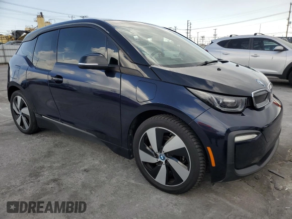 2018 BMW i3 with VIN WBY7Z4C58JVD95568, listed as a Copart auction lot 51867095 with Not provided miles and Salvage title. Bid and sale history available at DreamBid. Image 4.