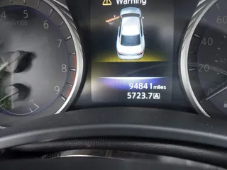 2015 Infiniti Q50 Premium z VIN JN1BV7AR8FM390785, wystawiony jako IAAI lot #42200437 z przebiegiem 94 841 mil mil oraz . Historia ofert i sprzedaży dostępna na DreamBid. Obrazek 15.