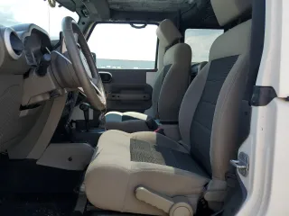 2010 Jeep Wrangler Sahara with VIN 1J4AA5D15AL167384, listed as a Copart auction lot 64210485 with 138,320 mi miles and Clean title. Bid and sale history available at DreamBid. Image 7.