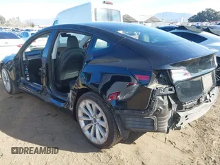 2022 Tesla Model 3 with VIN 5YJ3E1EA9NF295890, listed as a IAAI auction lot 41175917 with 42,230 mi miles and . Bid and sale history available at DreamBid. Image 3.