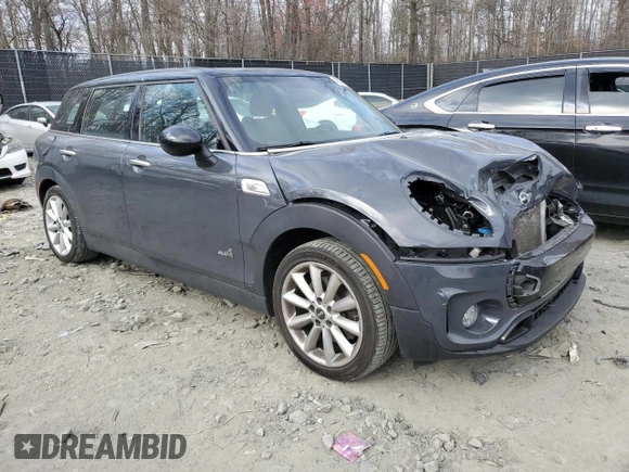 2017 MINI Clubman Cooper S with VIN WMWLU5C57H2E82584, listed as a Copart auction lot 48861365 with 90,418 mi miles and Salvage Title. Bid and sale history available at DreamBid. Image 4.