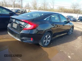 2020 Honda Civic LX with VIN 19XFC2F68LE029699, listed as a IAAI auction lot 41894102 with 113,900 mi miles and . Bid and sale history available at DreamBid. Image 4.