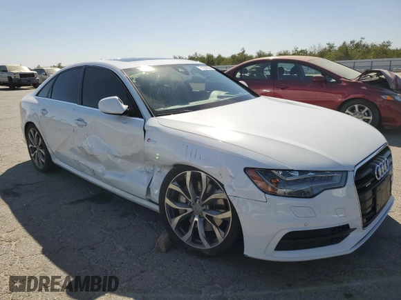 2015 Audi A6 Prestige with VIN WAUHGAFC7FN030286, listed as a Copart auction lot 71237874 with 74,334 mi miles and Salvage title. Bid and sale history available at DreamBid. Image 4.