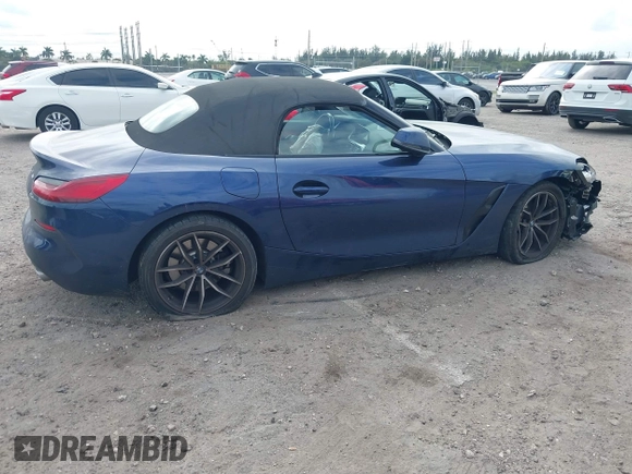 2021 BMW Z4 sDrive30i with VIN WBAHF3C05MWX11773, listed as a IAAI auction lot 41358869 with 16,373 mi miles. Bid and sale history available at carsss.com. Image 4.