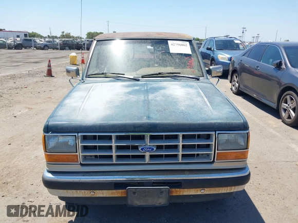 1990 Ford Ranger z VIN 1FTCR14T7LPB00718, wystawiony jako IAAI lot #42756062 z przebiegiem 77 393 mil mil oraz . Historia ofert i sprzedaży dostępna na DreamBid. Obrazek 6.