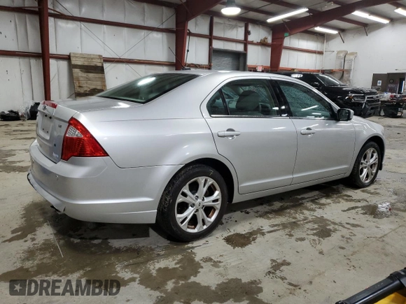2012 Ford Fusion SE z VIN 3FAHP0HA5CR371175, wystawiony jako Copart lot #52073675 z przebiegiem 135 813 mil mil oraz Czysty tytuł • Clean title. Historia ofert i sprzedaży dostępna na DreamBid. Obrazek 3.