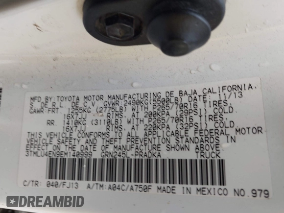 2014 Toyota Tacoma with VIN 3TMLU4EN9EM140999, listed as a IAAI auction lot 37765514 with 168,875 mi miles. Bid and sale history available at carsss.com. Image 9.