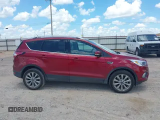 2018 Ford Escape Titanium with VIN 1FMCU0J96JUD58854, listed as a IAAI auction lot 42590609 with 77,825 mi miles and . Bid and sale history available at DreamBid. Image 13.
