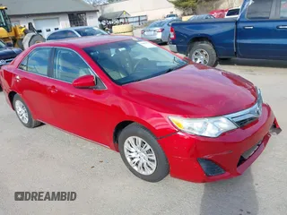 2012 Toyota Camry L z VIN 4T4BF1FK4CR245887, wystawiony jako IAAI lot #41865398 z przebiegiem 167 657 mil mil oraz . Historia ofert i sprzedaży dostępna na DreamBid. Obrazek 1.