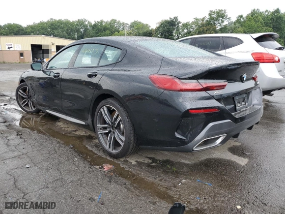 2022 BMW 8 Series 840i with VIN WBAGV4C04NCJ54569, listed as a Copart auction lot 61818223 with 23,680 mi miles. Bid and sale history available at carsss.com. Image 2.