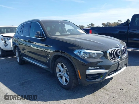 2019 BMW X3 sDrive30i with VIN 5UXTR7C5XKLR51471, listed as a IAAI auction lot 41718818 with 52,670 mi miles. Bid and sale history available at carsss.com. Image 1.