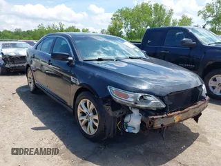 2011 Ford Taurus SEL z VIN 1FAHP2EW4BG157182, wystawiony jako IAAI lot #42361228 z przebiegiem 201 740 mil mil oraz . Historia ofert i sprzedaży dostępna na DreamBid. Obrazek 1.