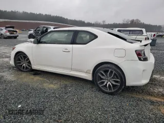 2014 Scion tC z VIN JTKJF5C78E3086696, wystawiony jako Copart lot #84040544 z przebiegiem 83 973 mil mil oraz Szkoda całkowita • Salvage title. Historia ofert i sprzedaży dostępna na DreamBid. Obrazek 2.