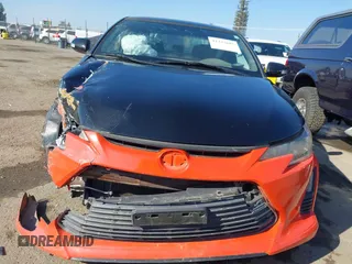 2015 Scion tC with VIN JTKJF5C71FJ006863, listed as a IAAI auction lot 41332681 with 91,559 mi miles. Bid and sale history available at carsss.com. Image 13.