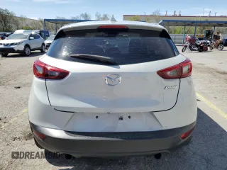 2018 Mazda CX-3 Touring z VIN JM1DKFC74J0312864, wystawiony jako Copart lot #55862845 z przebiegiem 75 584 mil mil oraz Szkoda całkowita • Salvage title. Historia ofert i sprzedaży dostępna na DreamBid. Obrazek 6.