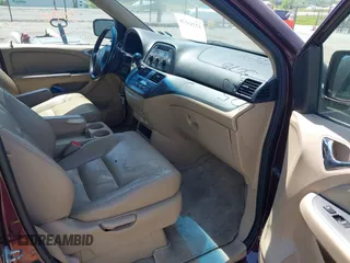 2007 Honda Odyssey EX-L with VIN 5FNRL38717B455291, listed as a IAAI auction lot 42253070 with 222,016 mi miles and . Bid and sale history available at DreamBid. Image 5.