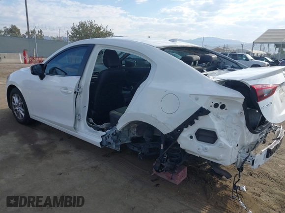 2016 Mazda 3 i Grand Touring with VIN JM1BM1X73G1346876, listed as a IAAI auction lot 40283164 with 102,264 mi miles and . Bid and sale history available at DreamBid. Image 3.