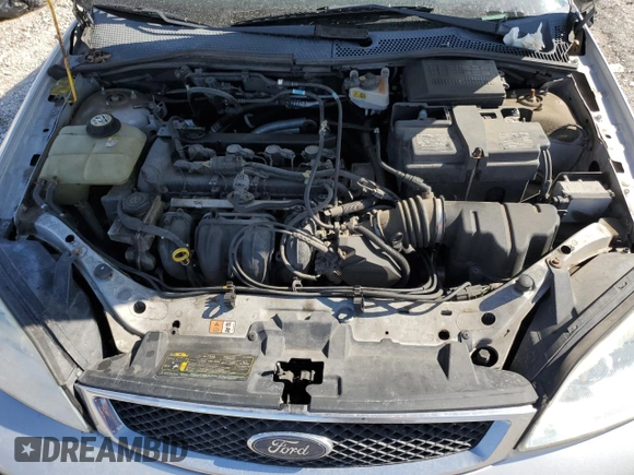 2007 Ford Focus S with VIN 1FAHP37N77W342091, listed as a Copart auction lot 48664305 with 120,661 mi miles and Salvage Title. Bid and sale history available at carsss.com. Image 13.