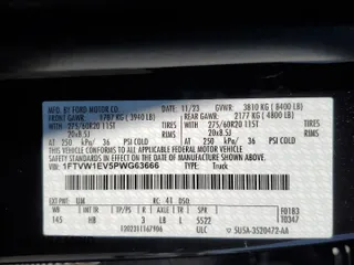 2023 Ford F-150 Lightning Pro with VIN 1FTVW1EV5PWG63666, listed as a Copart auction lot 60998415 with 35,089 mi miles and Salvage title. Bid and sale history available at DreamBid. Image 13.