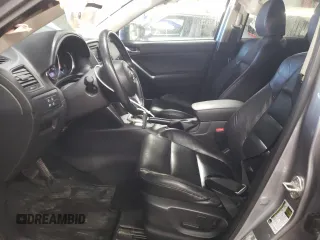 2015 Mazda CX-5 Grand Touring with VIN JM3KE4DY5F0456142, listed as a Copart auction lot 49353845 with 193,512 mi miles and Salvage Title. Bid and sale history available at carsss.com. Image 7.