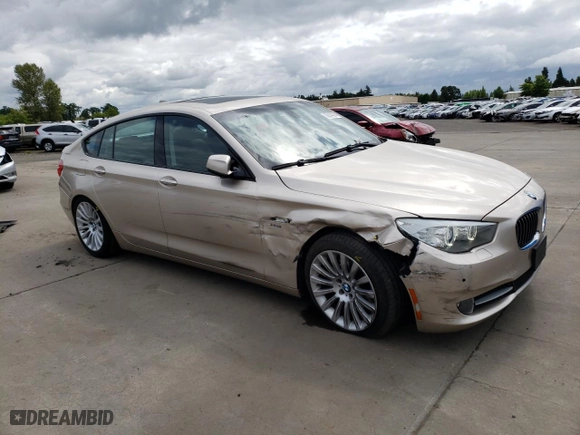 2011 BMW 5 Series Gran Turismo 535i xDrive with VIN WBASP2C52BC337047, listed as a Copart auction lot 56614294 with 116,262 mi miles and Salvage Title. Bid and sale history available at carsss.com. Image 4.