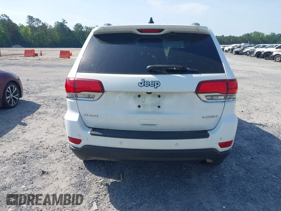 2020 Jeep Grand Cherokee Laredo E with VIN 1C4RJFAG1LC389026, listed as a IAAI auction lot 42261396 with 100,409 mi miles and . Bid and sale history available at DreamBid. Image 16.