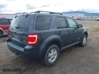 2008 Ford Escape XLT with VIN 1FMCU93Z88KC16688, listed as a IAAI auction lot 41910735 with 207,577 mi miles. Bid and sale history available at carsss.com. Image 4.