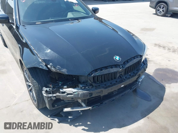 2019 BMW 3 Series 330i with VIN WBA5R1C51KFH09402, listed as a IAAI auction lot 41869138 with 59,115 mi miles and . Bid and sale history available at DreamBid. Image 6.
