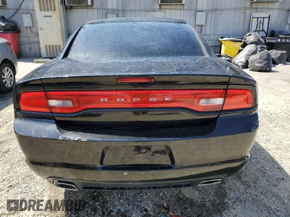 2013 Dodge Charger SE z VIN 2C3CDXBG6DH509939, wystawiony jako Copart lot #57851415 z przebiegiem 182 634 mil mil oraz Szkody całkowita. Historia ofert i sprzedaży dostępna na DreamBid. Obrazek 6.