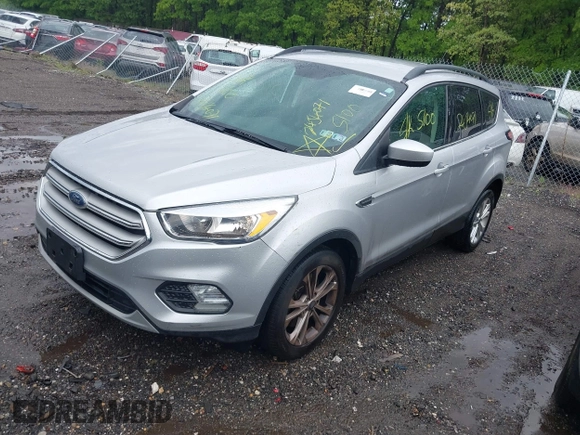 2018 Ford Escape SE with VIN 1FMCU9G99JUC41605, listed as a IAAI auction lot 39500946 with 114,032 mi miles. Bid and sale history available at carsss.com. Image 2.