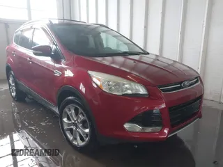 2013 Ford Escape SEL z VIN 1FMCU9HX2DUB79885, wystawiony jako IAAI lot #42341050 z przebiegiem 117 236 mil mil oraz . Historia ofert i sprzedaży dostępna na DreamBid. Obrazek 1.