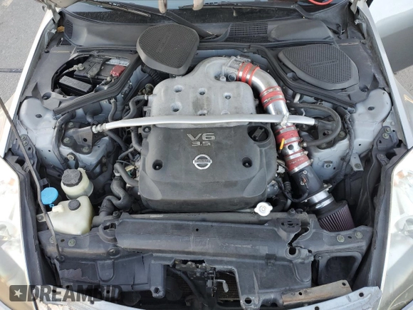 2005 Nissan 350Z Touring z VIN JN1AZ36A15M756659, wystawiony jako Copart lot #75458384 z przebiegiem 101 489 mil mil oraz Szkoda całkowita • Salvage title. Historia ofert i sprzedaży dostępna na DreamBid. Obrazek 12.