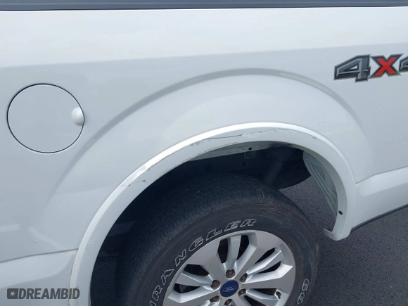 2015 Ford F-150 XLT w/HD Payload Pkg with VIN 1FTFW1EGXFFB88326, listed as a IAAI auction lot 41972016 with 204,767 mi miles. Bid and sale history available at carsss.com. Image 6.