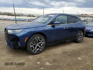 2023 BMW iX xDrive50 with VIN WB523CF0XPCL15501, listed as a Copart auction lot 46117065 with 14,695 mi miles and Salvage Title. Bid and sale history available at carsss.com. Image 1.
